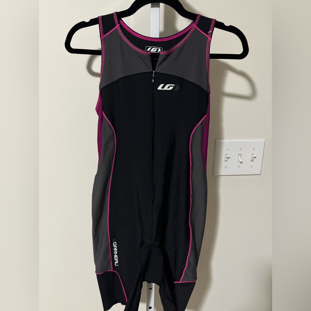 Louis Garneau triathlon suit in black, grey, and pink.